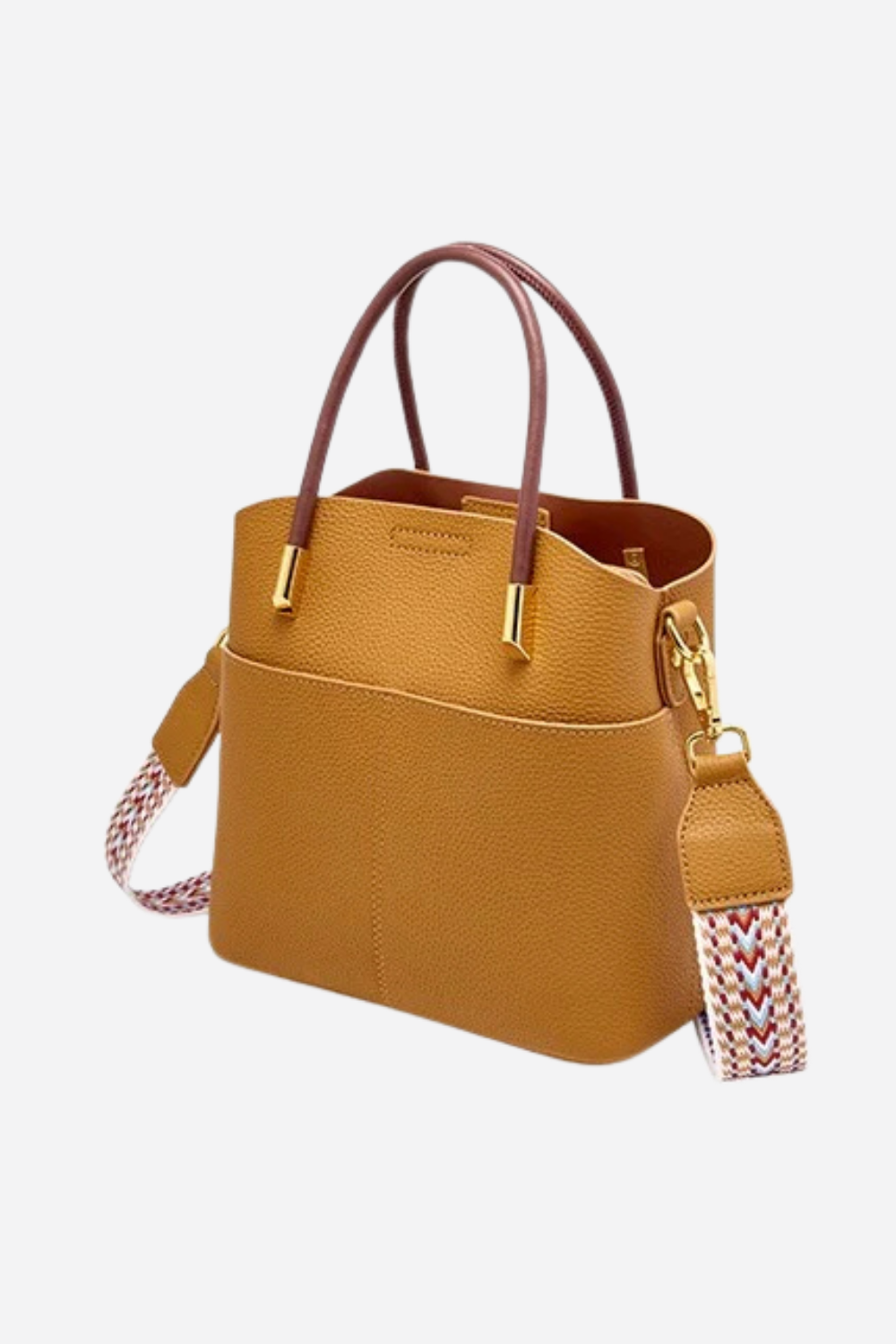 Yellow handbag with a strap on a white background